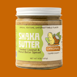 Jar of Shaka Butter Toasted Coconut & Peanut Butter Spread on an orange background