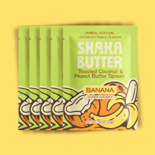 Shaka Butter Toasted Coconut & Peanut Butter Spread single serve packaging on a yellow background