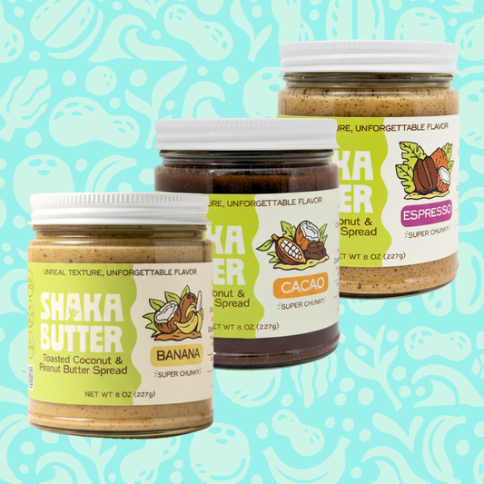 Three jars of Shaka Butter, one per flavor, on a light blue patterned background